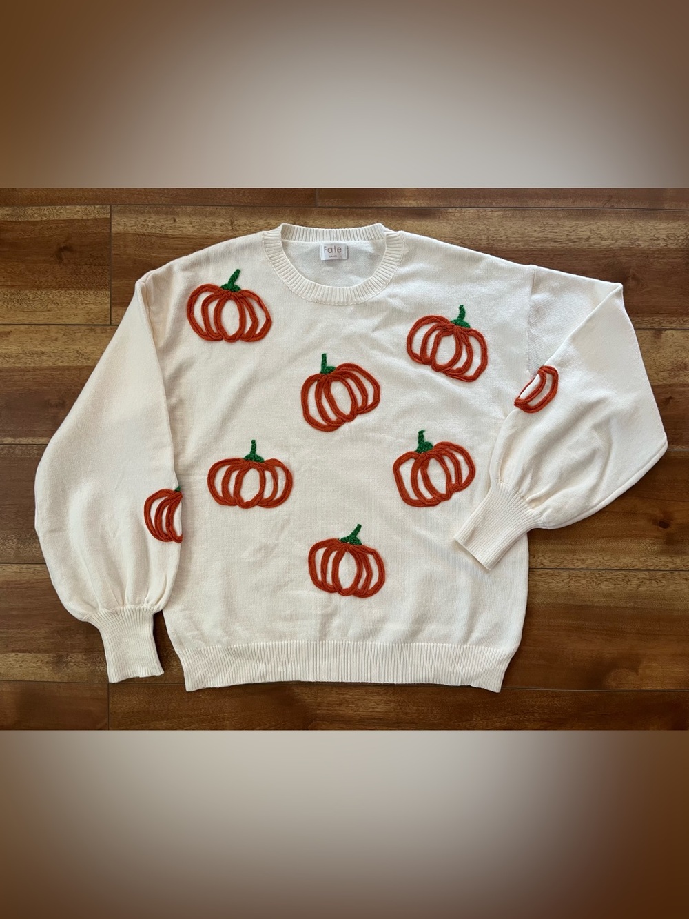 Fate Cream Crewneck Pullover Sweater with Orange Pumpkin Motif